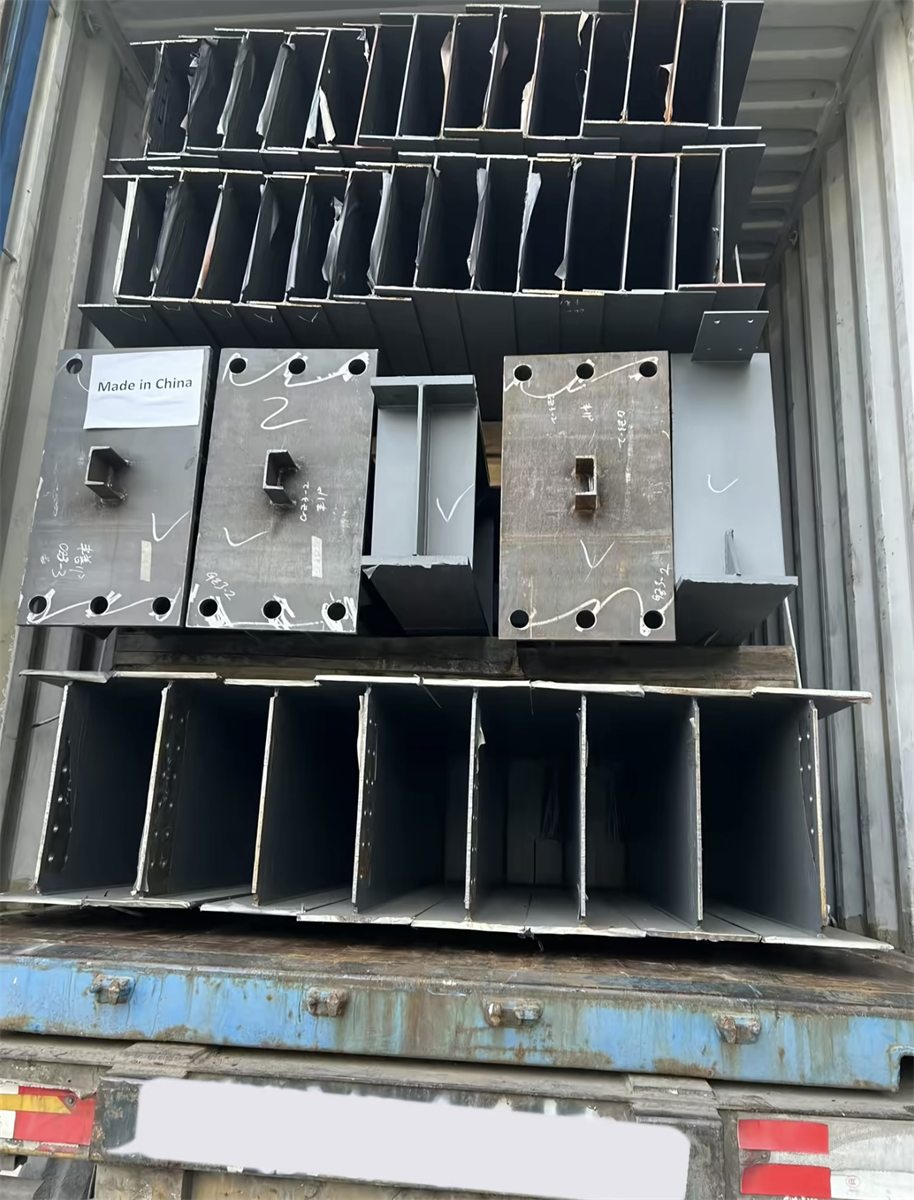 Packed steel members prepared beside a container